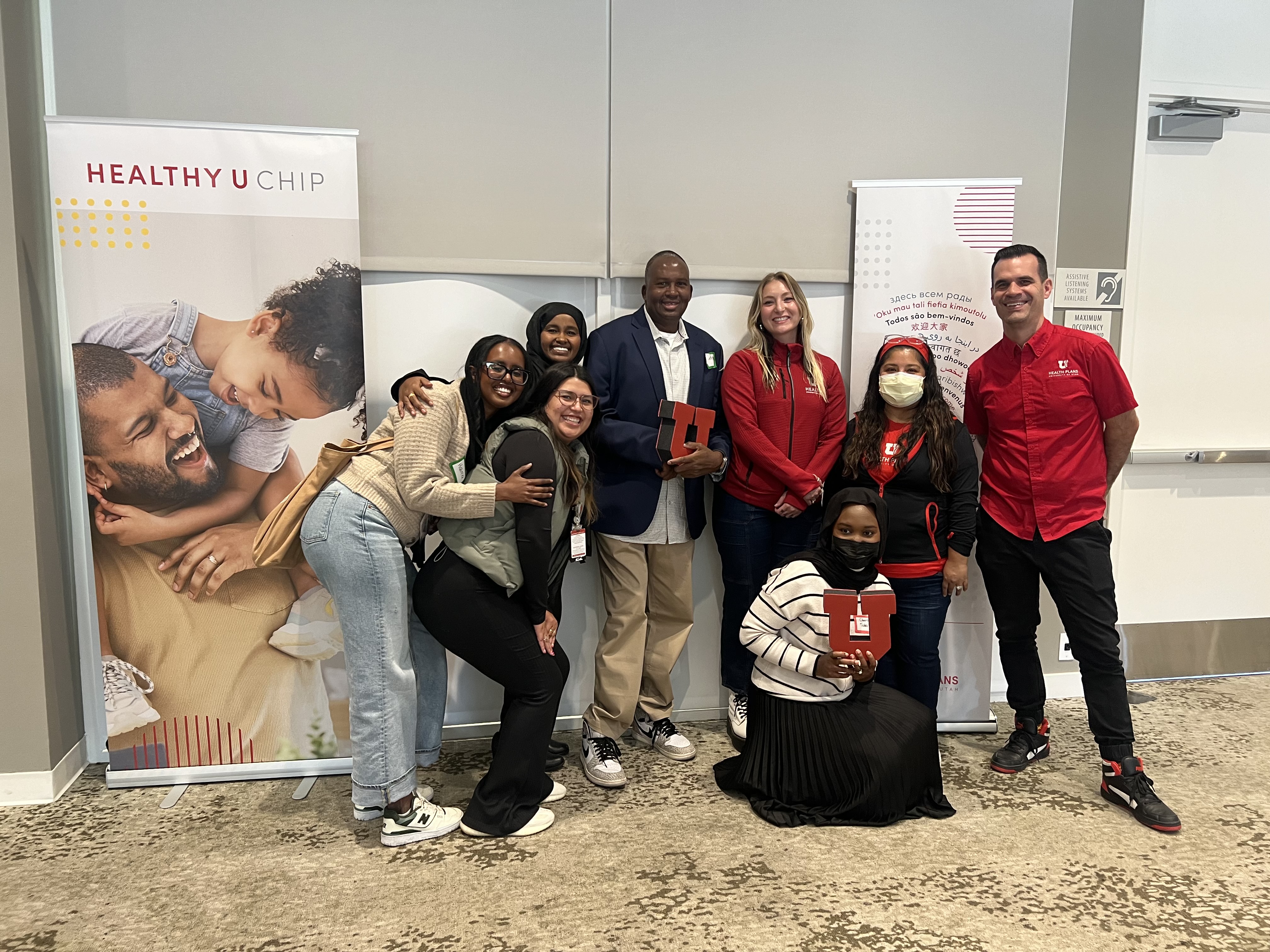 UofU students and youth posing for a photo